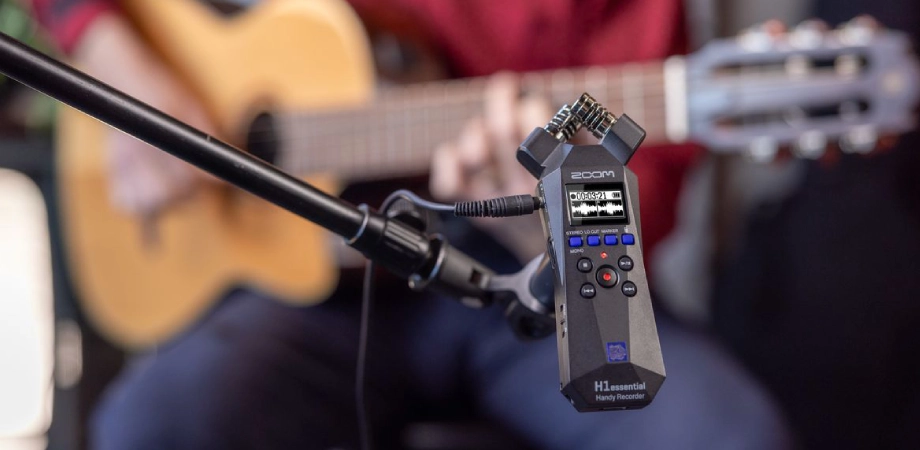 Zoom H1essential portable audio recorder featuring 32-bit float recording and built-in X/Y stereo microphones.